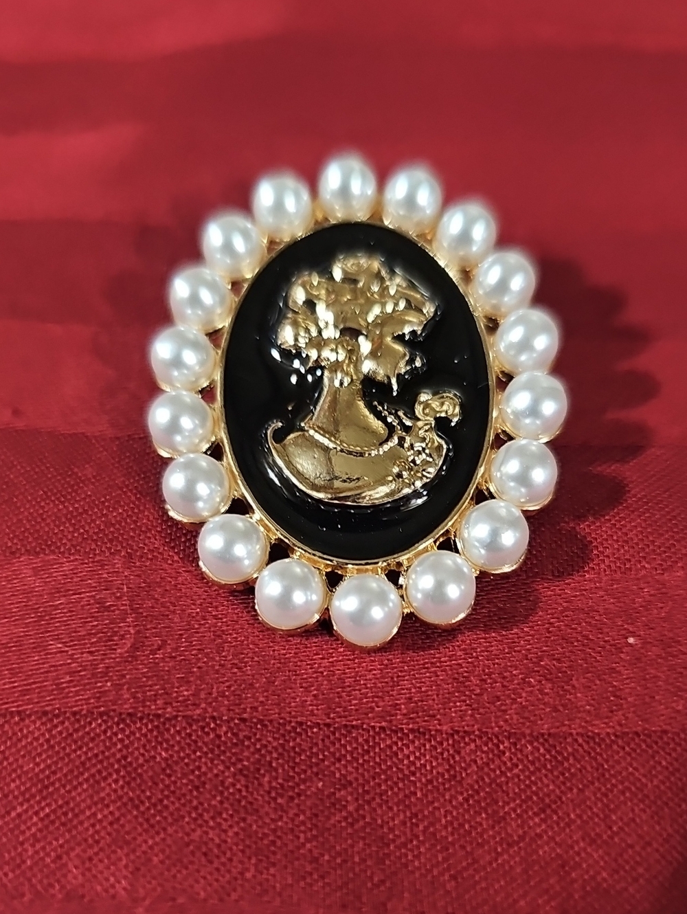 Gold-Tone Black Cameo Brooch with Pearl Halo